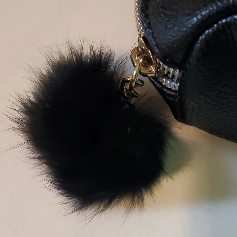 Betsey Johnson fux leatherpanda makeup case with pompom tail zipper